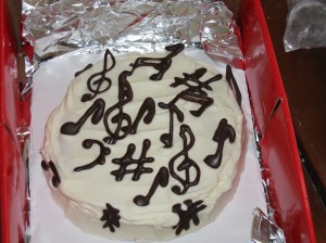 Chocolate music on a flourless chocolate cake.